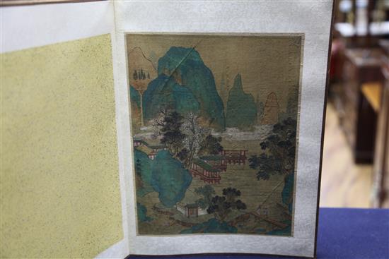 An album of twelve Chinese paintings on silk, c.1900, 36cm x 26cm